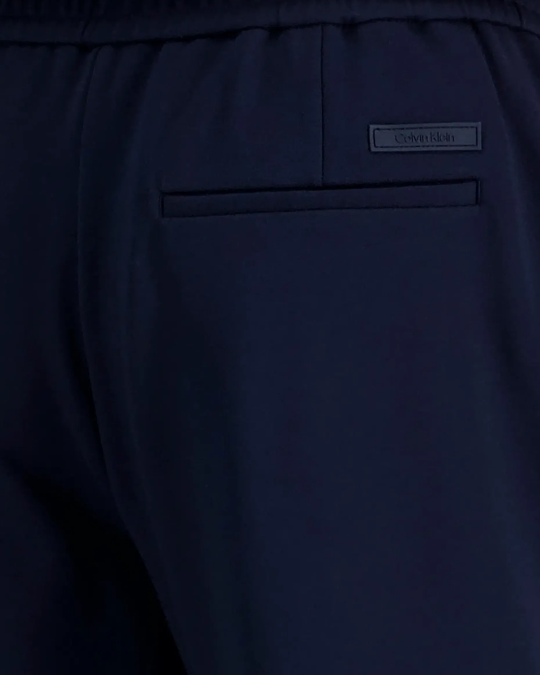 Calvin Klein Slim tapered knit pleated pant housut