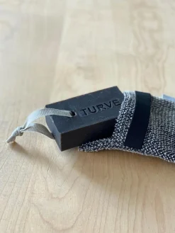 Lapuan Kankurit Kivi saippuapesin zero waste musta-pellava